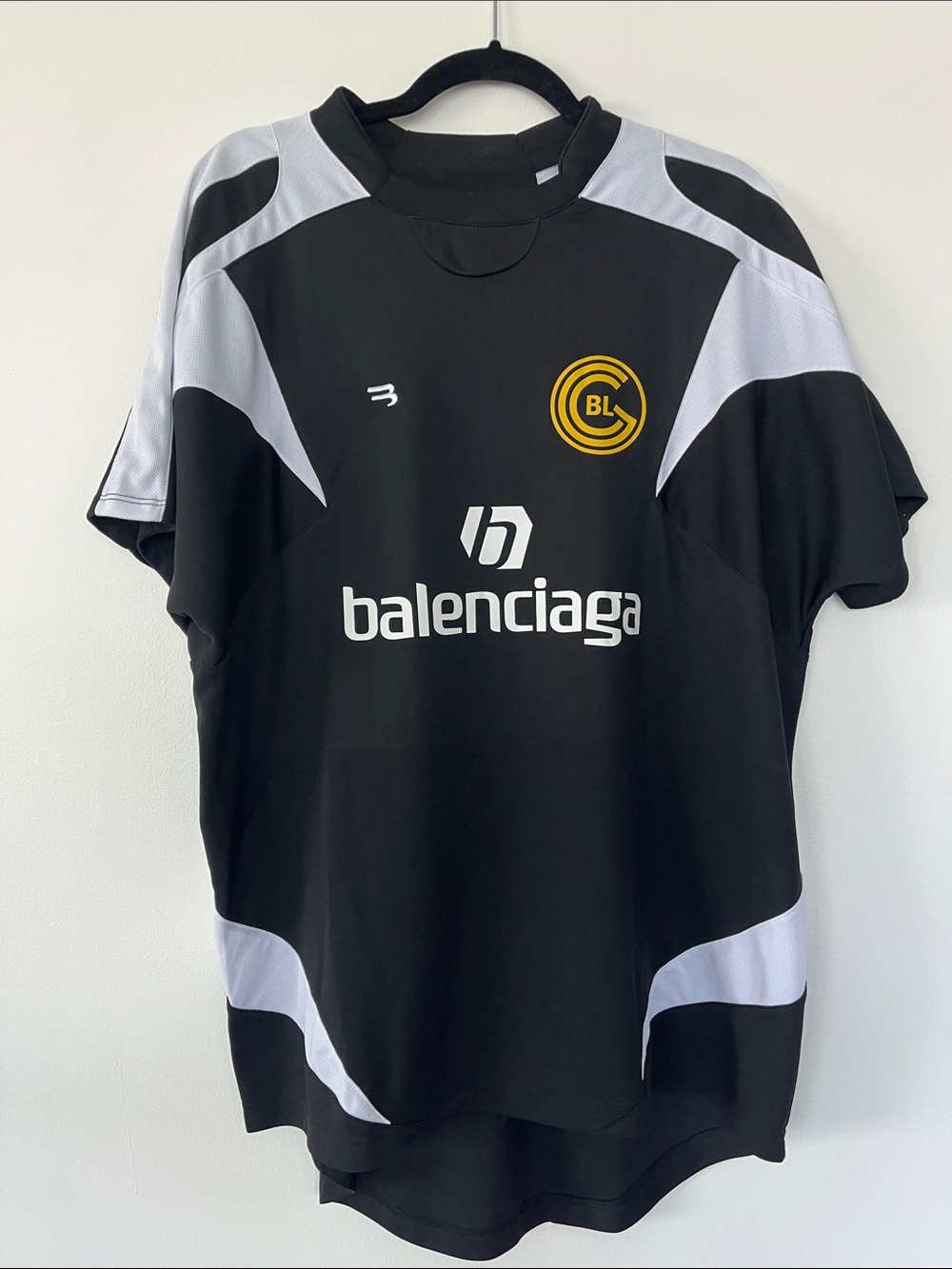 Balenciaga Black and White Logo Football-Style Tee with Yellow Crest